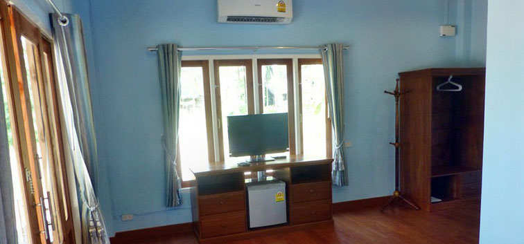 Coconut Garden Deluxe Bungalows Tv, refrigerator, air-conditioner and furniture