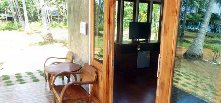 Coconut Garden Deluxe Bungalows chairs and table